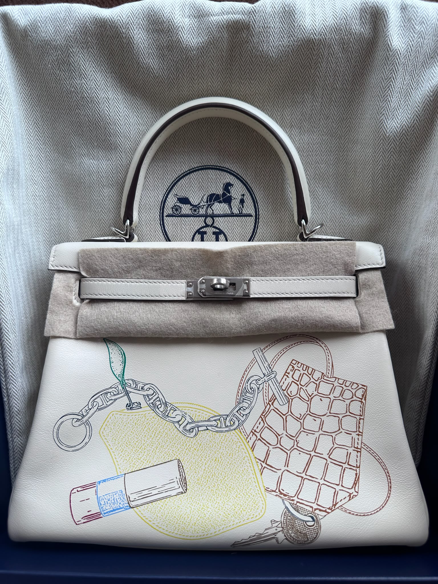Hermès Kelly 25 In & Out Nata Swift PHW